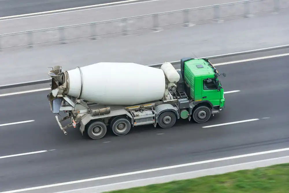 A concrete mixer on the road